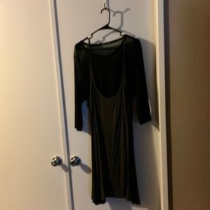 Green spaghetti strap dress with black mesh top. Top can be worn under or above